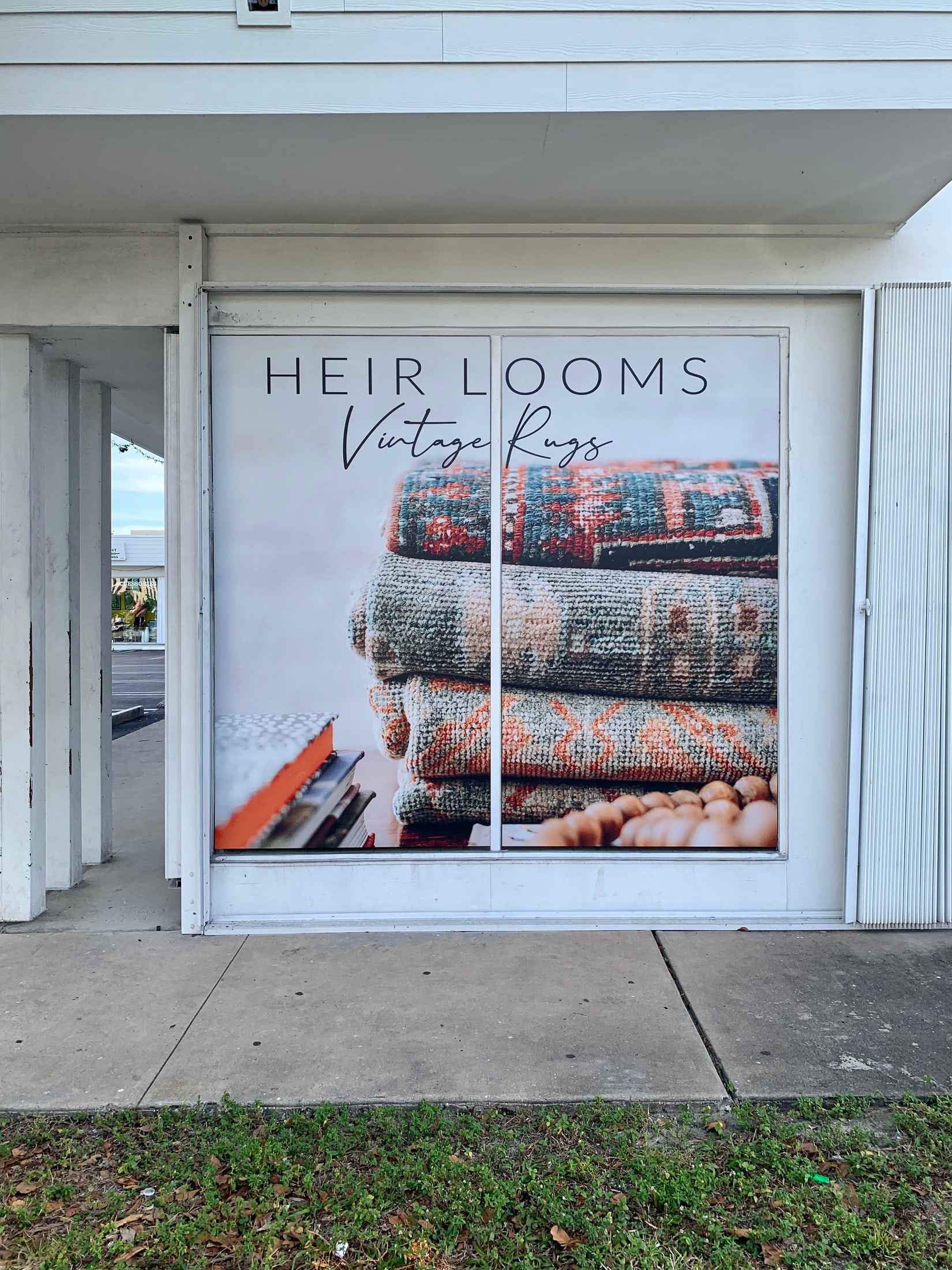 Storefront window graphics for a vintage rug gallery for Heir Looms Vintage Rugs