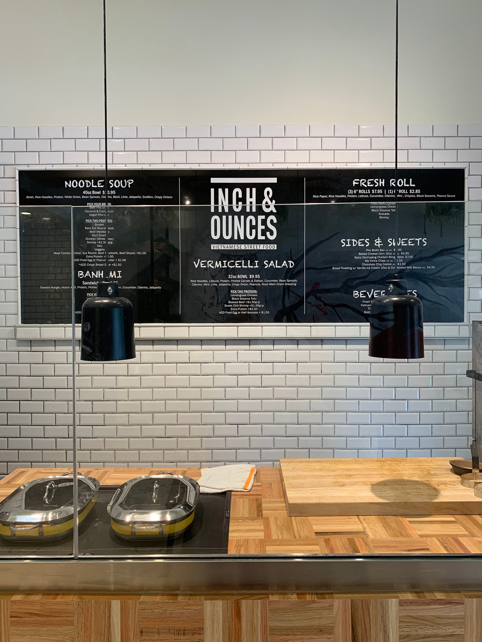 Interior menu boards for a pho and banh mi shop for Inch & Ounce, West Palm Beach, FL