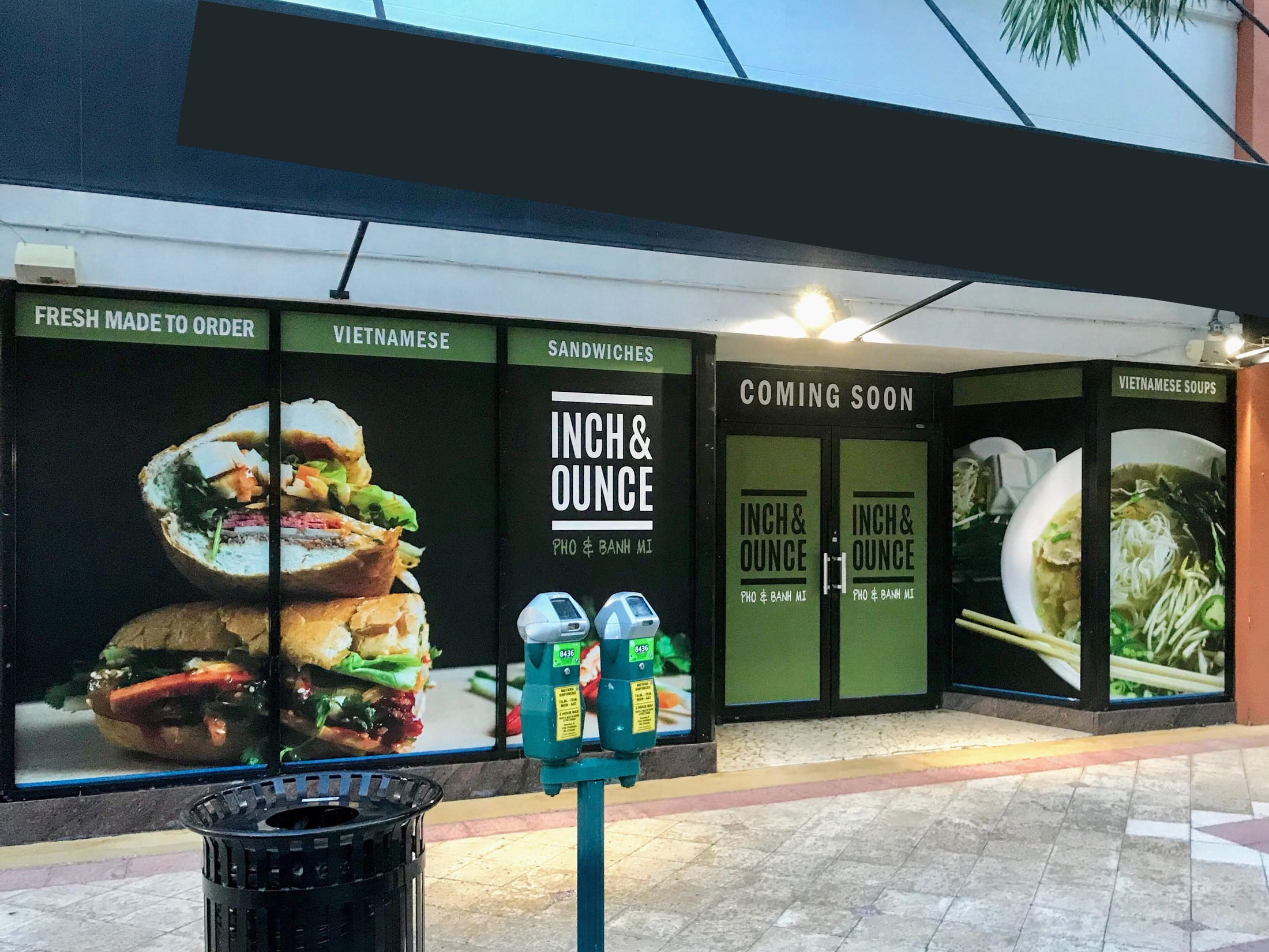 Full storefront window graphics for a pho and banh mi opening for Inch & Ounce