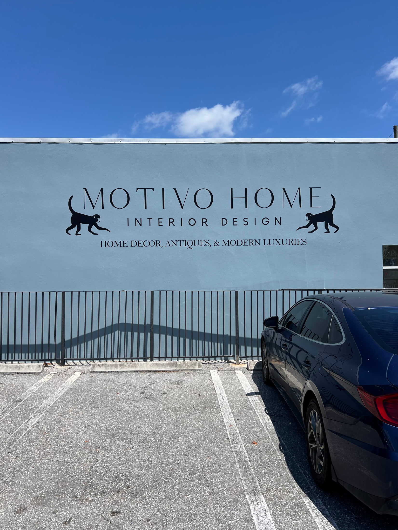 Exterior wall sign for an interior design studio for Motivo Home, South Florida