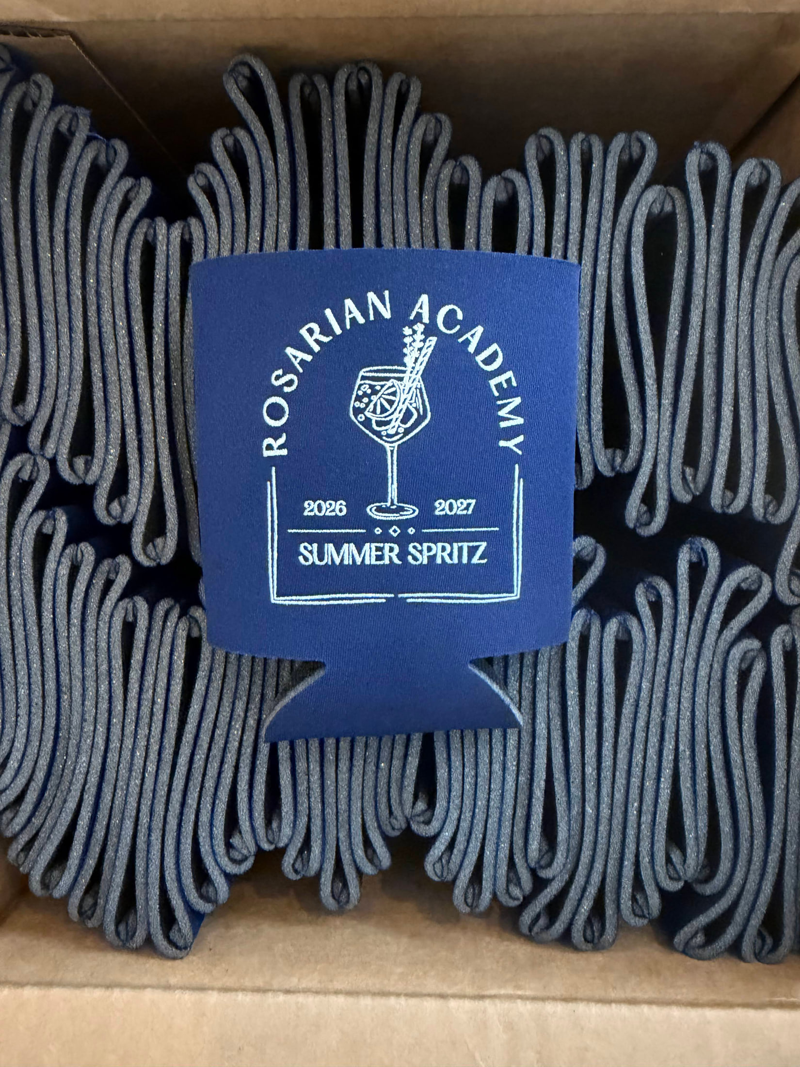 Event koozies for a school fundraiser for Rosarian Academy, West Palm Beach, FL